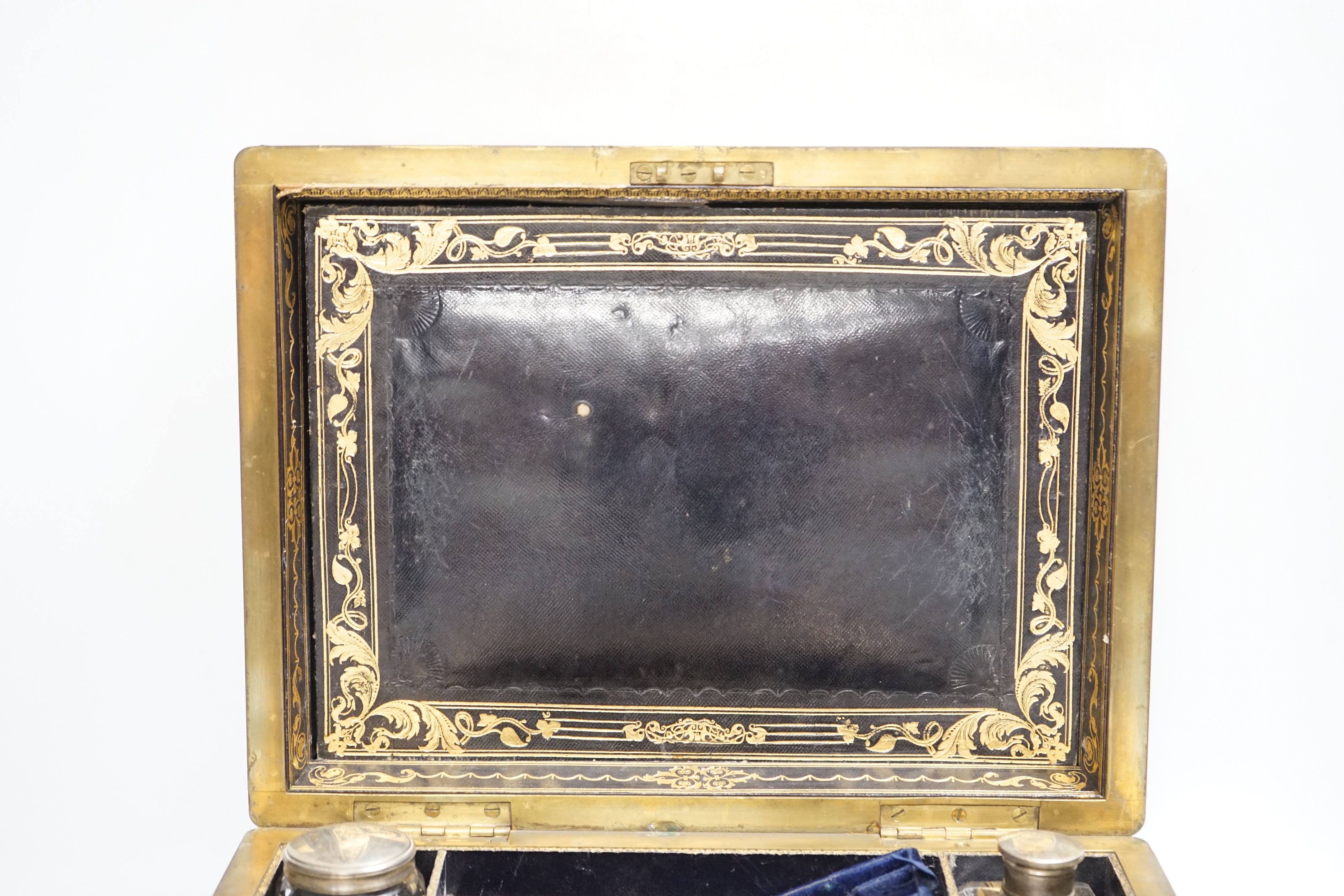 A Victorian rosewood brass bound toilet box, with silver plate mounted bottles and Amber and Jet beads box, 31.5cm wide x 14cm high